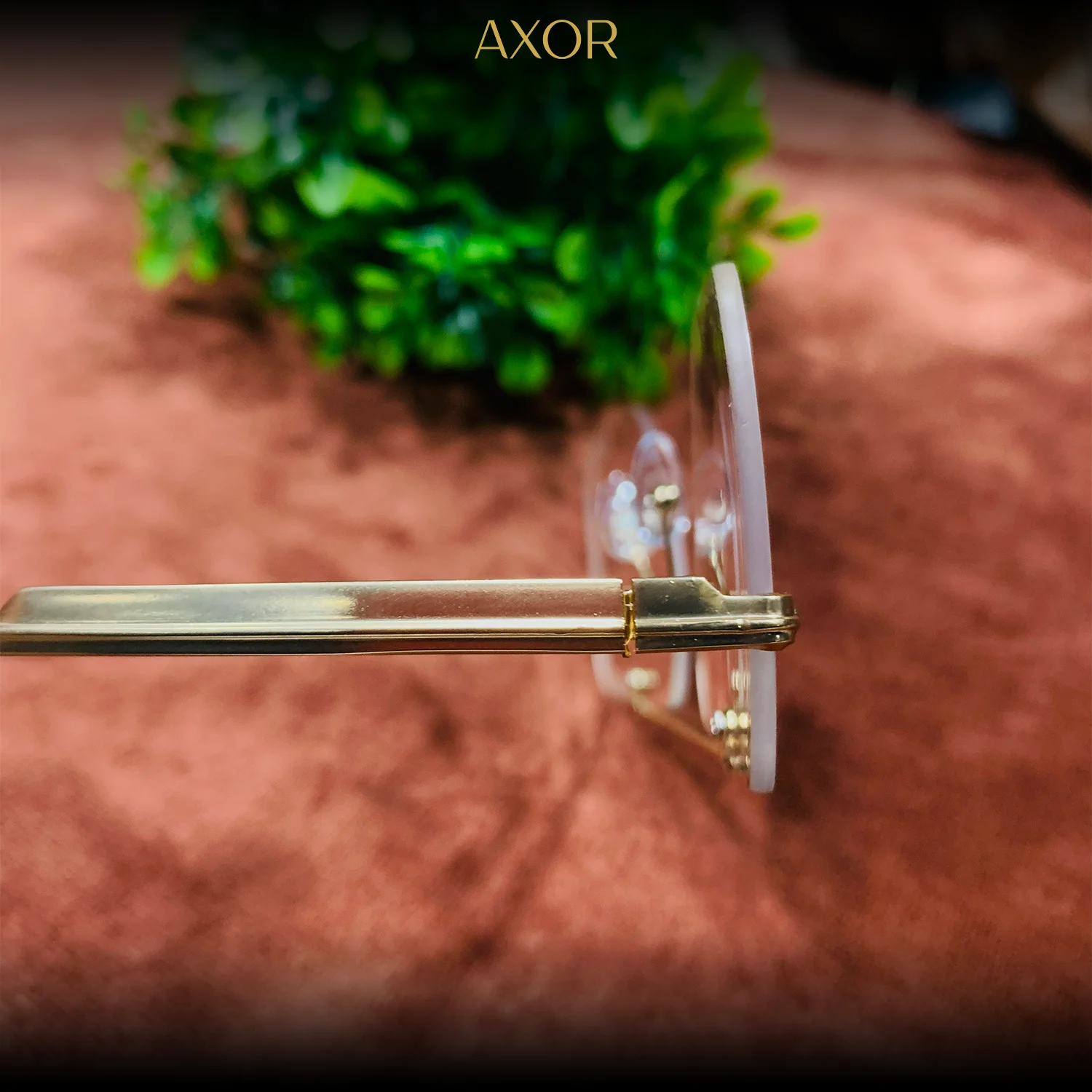 Side profile of gold rimless frame